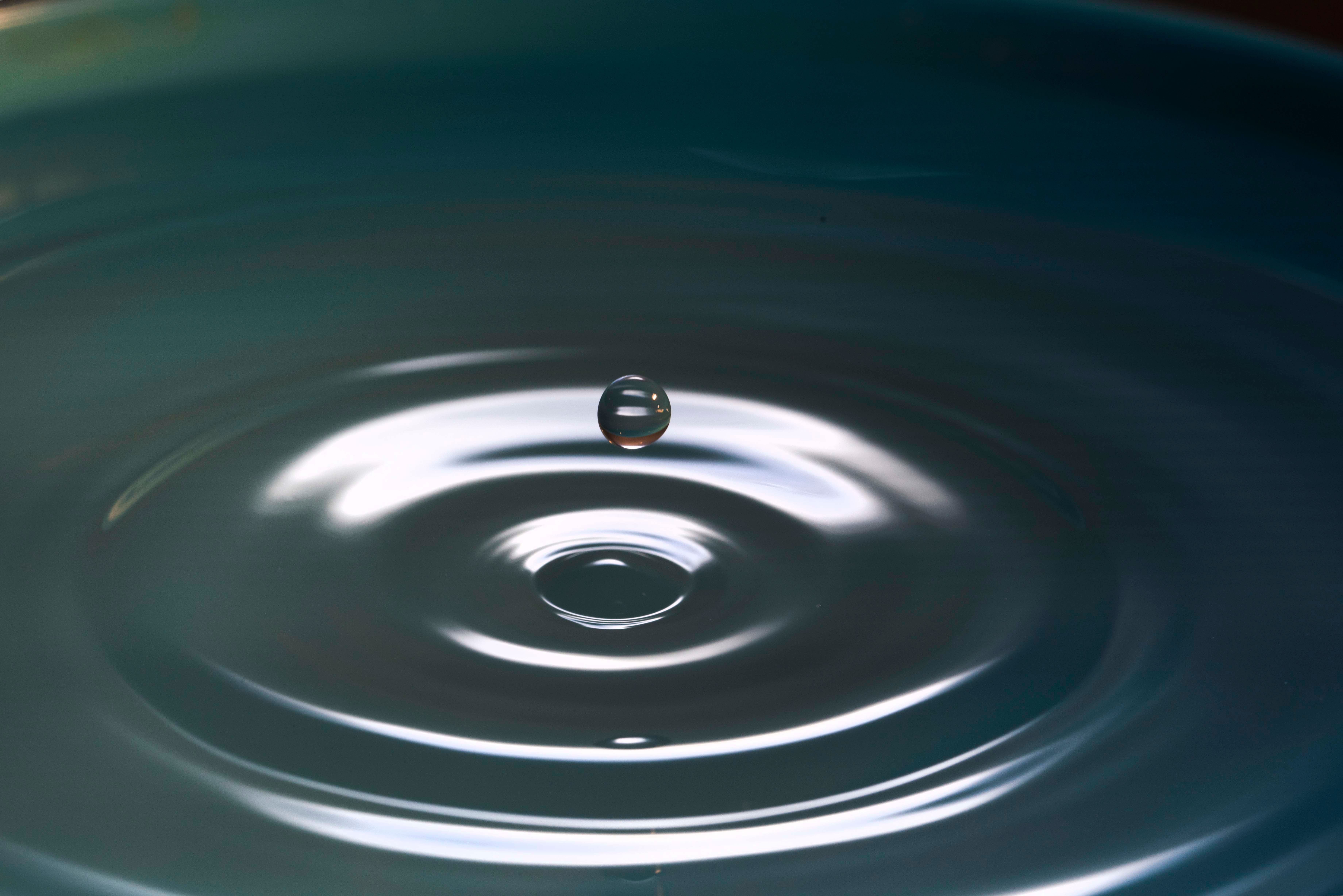 A drop of water creating a ripple