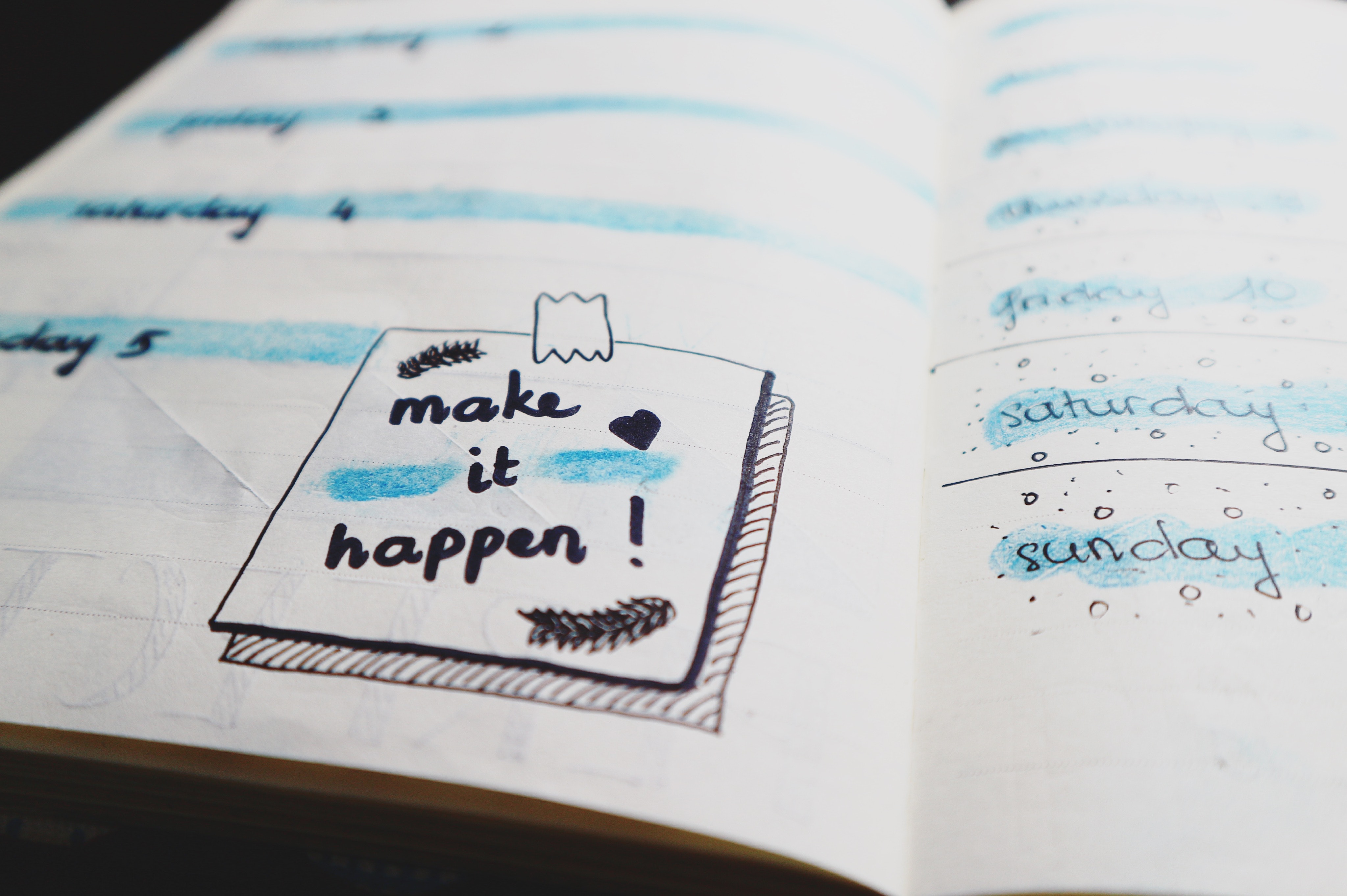 A diary page with 'make it happen' written in it