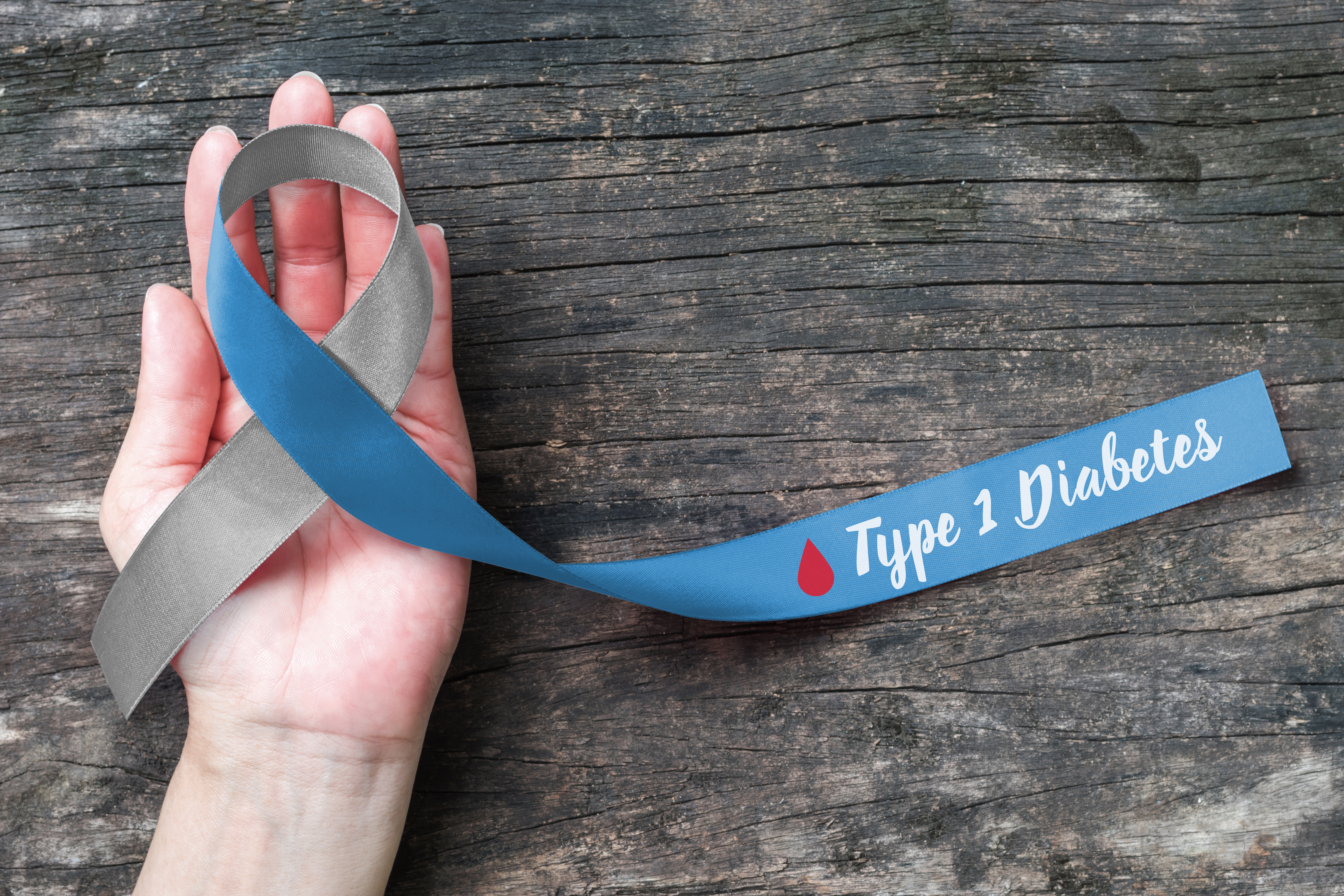 Type 1 diabetes on a ribbon