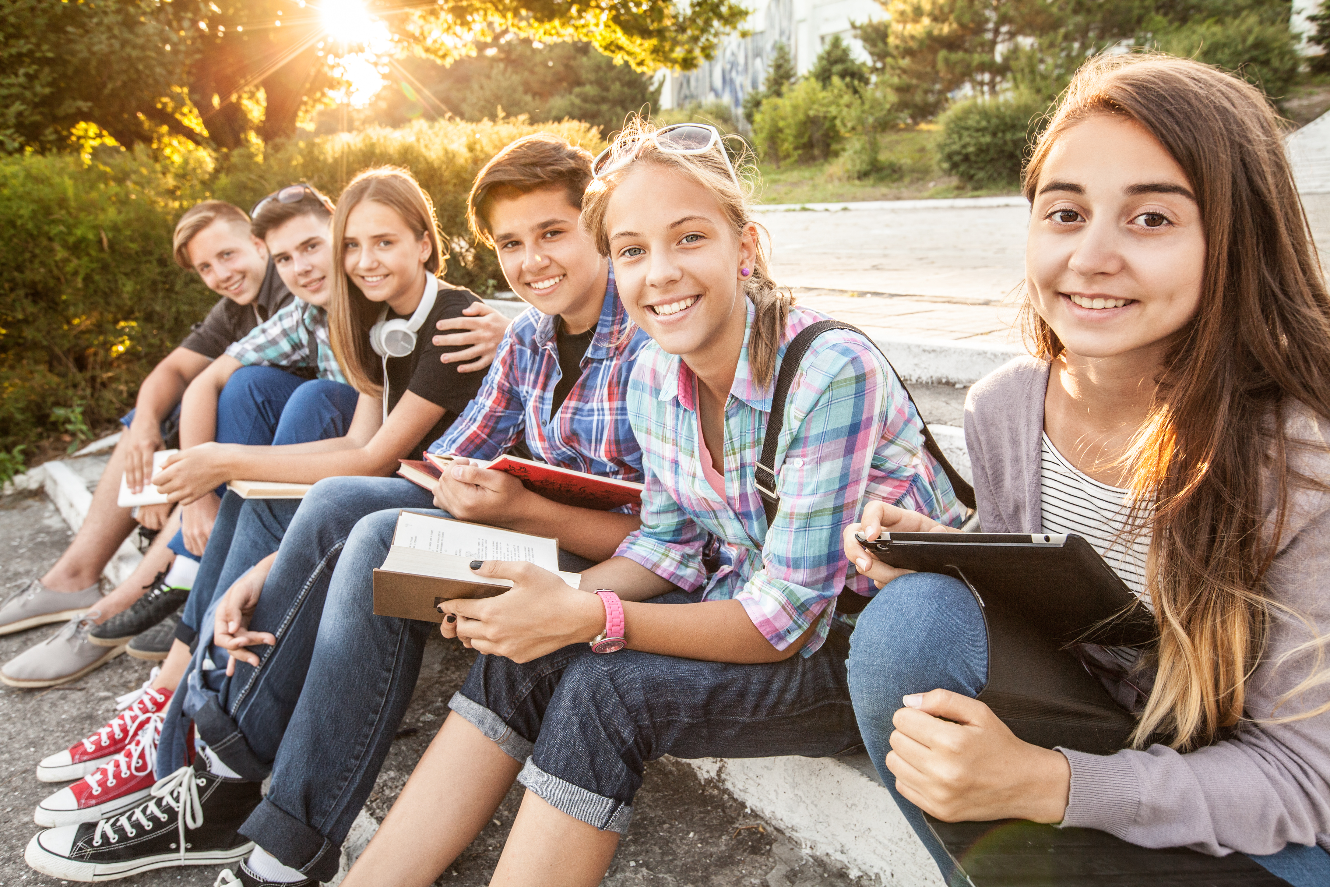 Group of teenagers outside in the sun
