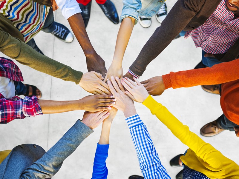 Many hands all connected
