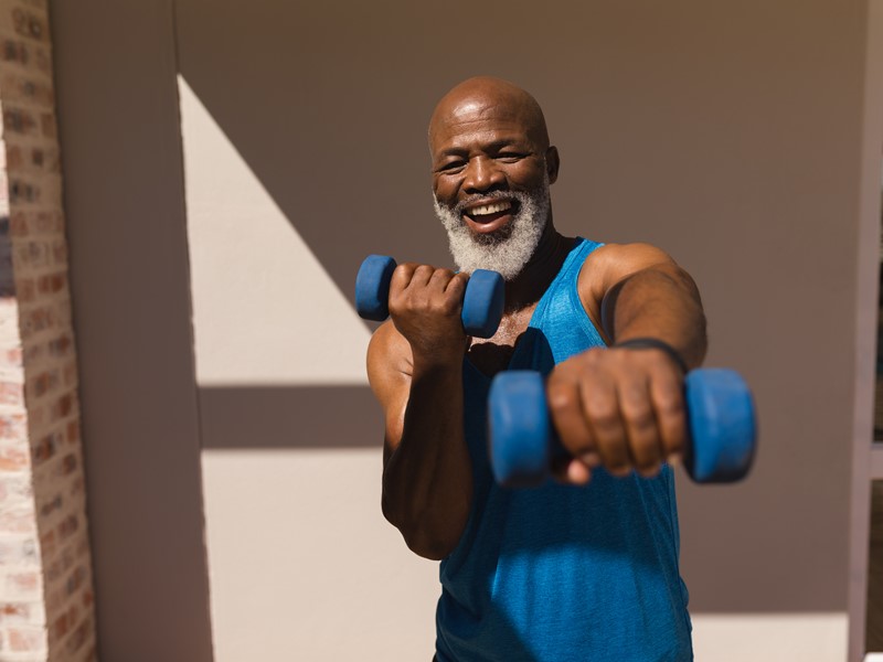 Man exercising with hand weights