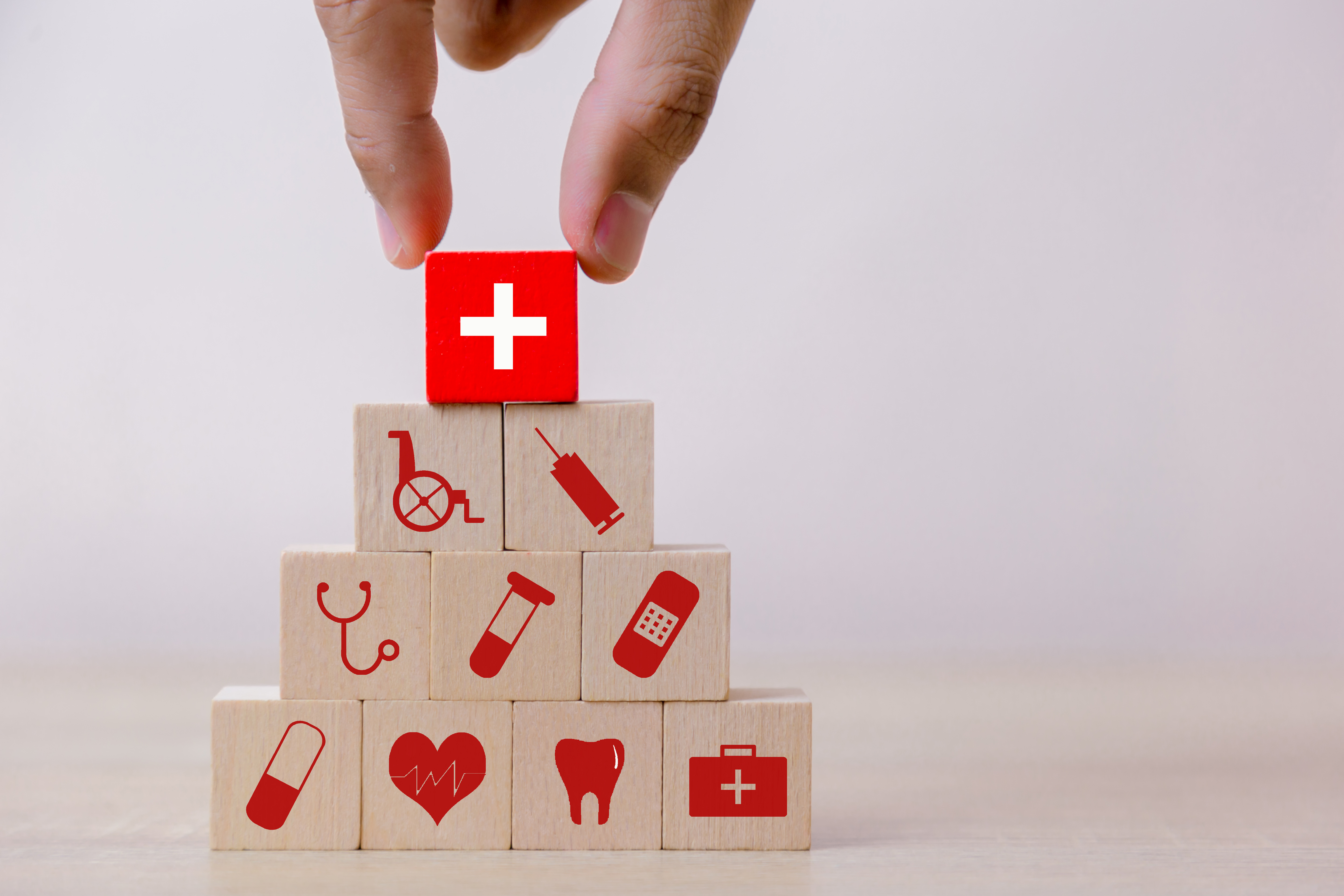 Building blocks with different health symbols