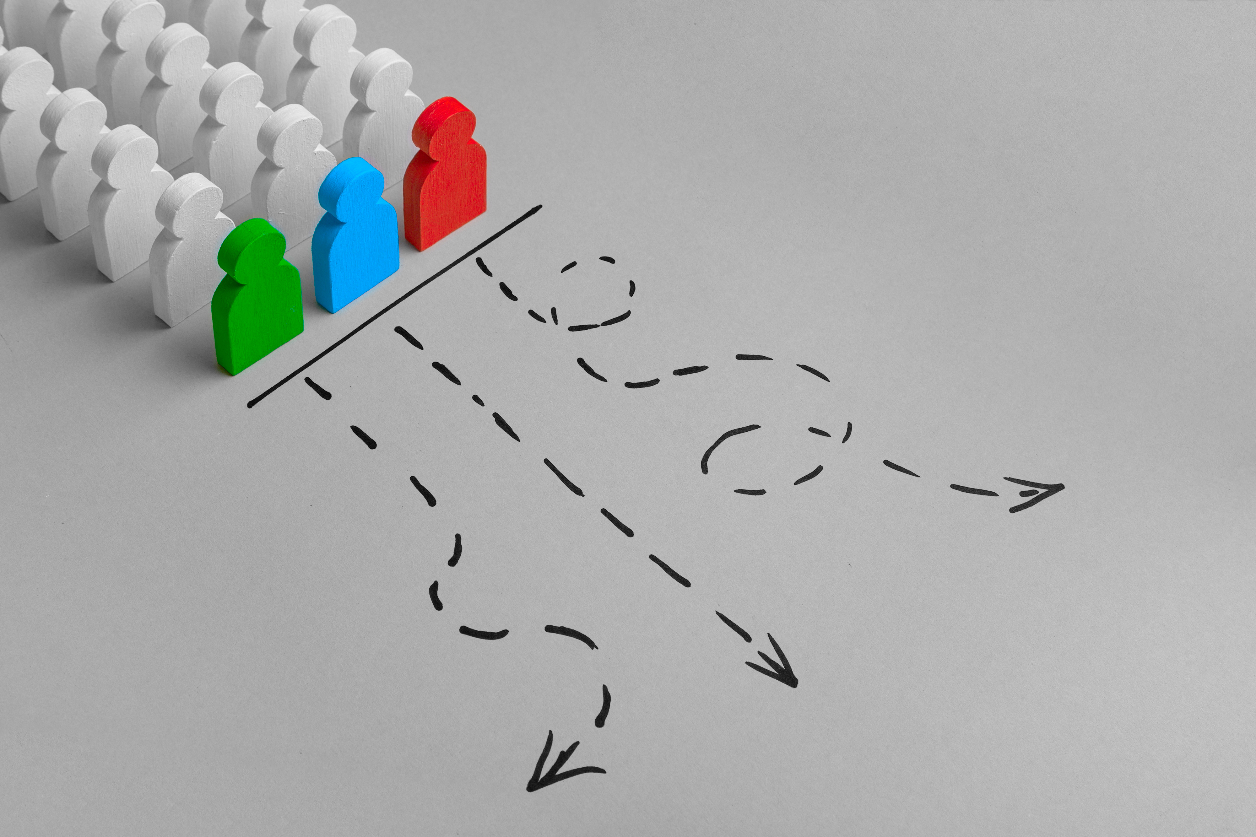 Figures with different journey paths drawn out